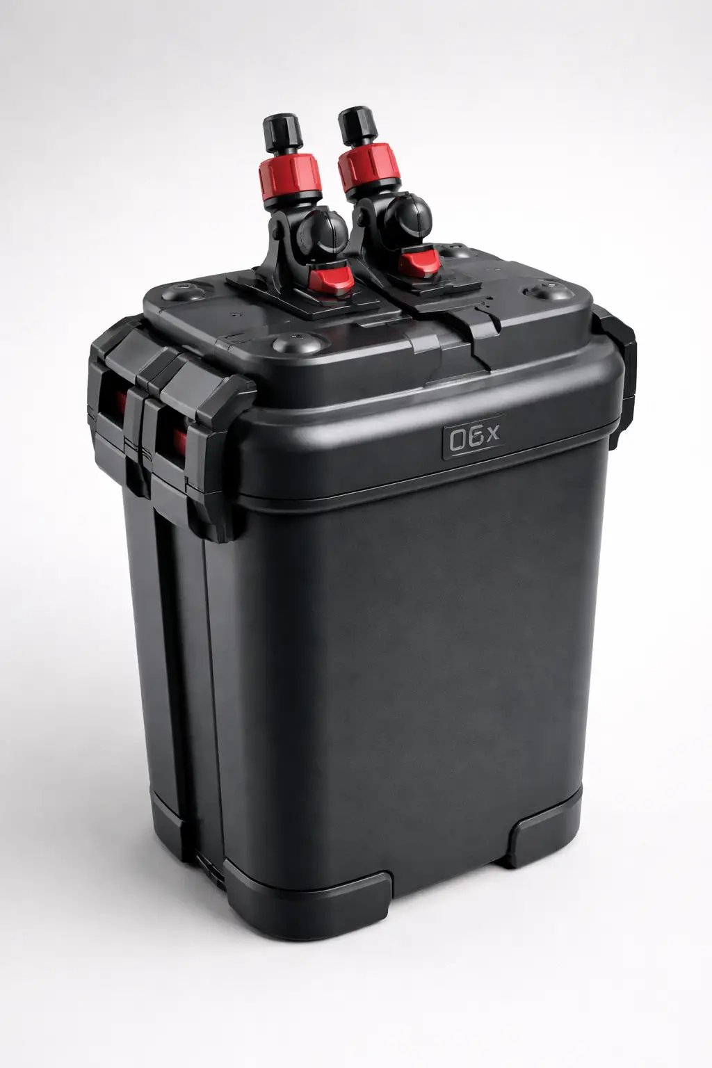 Black rectangular canister-shaped device with red fittings on a light background